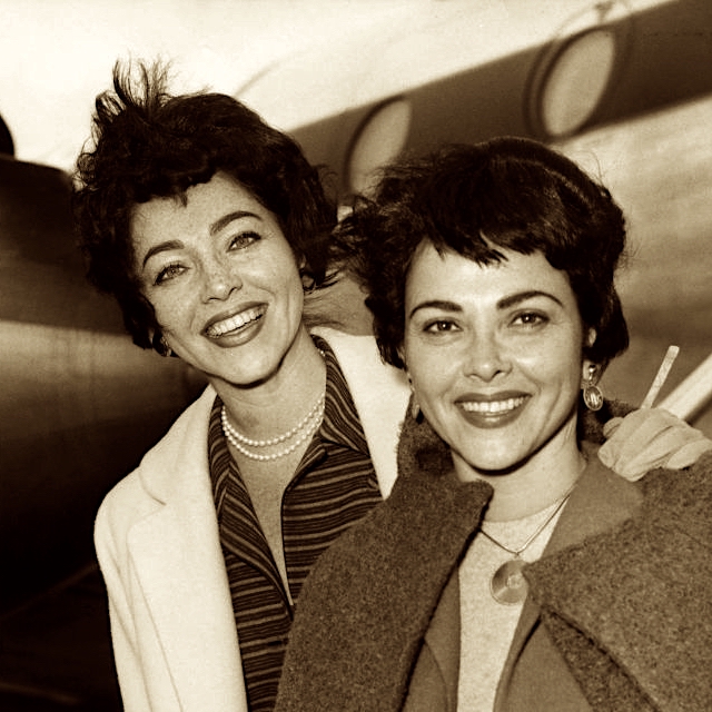 The Barry Sisters, Merna (left) and Claire, arrive in the UK from America, to sing at the Colony Restaurant, 3rd October 1958. (Photo by J. Wilds/Keystone/Hulton Archive/Getty Images)